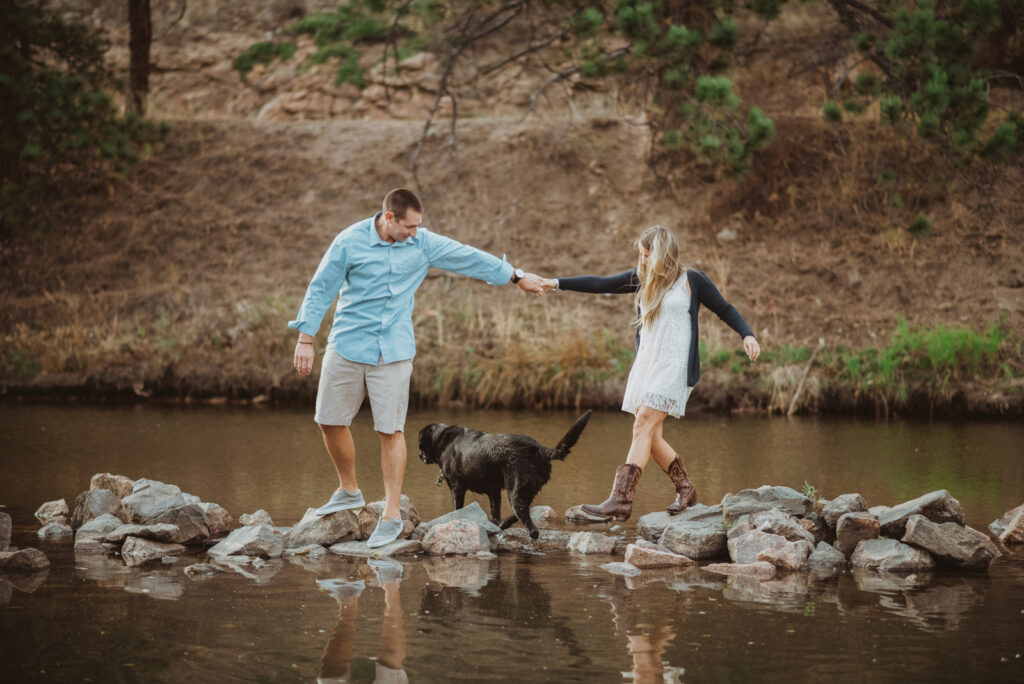 Evergreen Lake House outdoor lake nature trail adventurous candid fun engagement picture | From the Hip Photo Denver Colorado portrait photography 