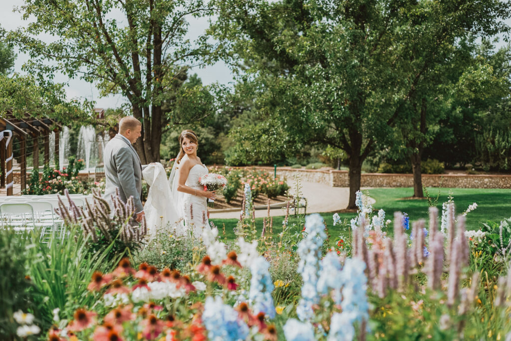 Hudson Gardens outdoor garden park floral plants candid fun loving wedding picture | From the Hip Photo Denver Colorado portrait photography