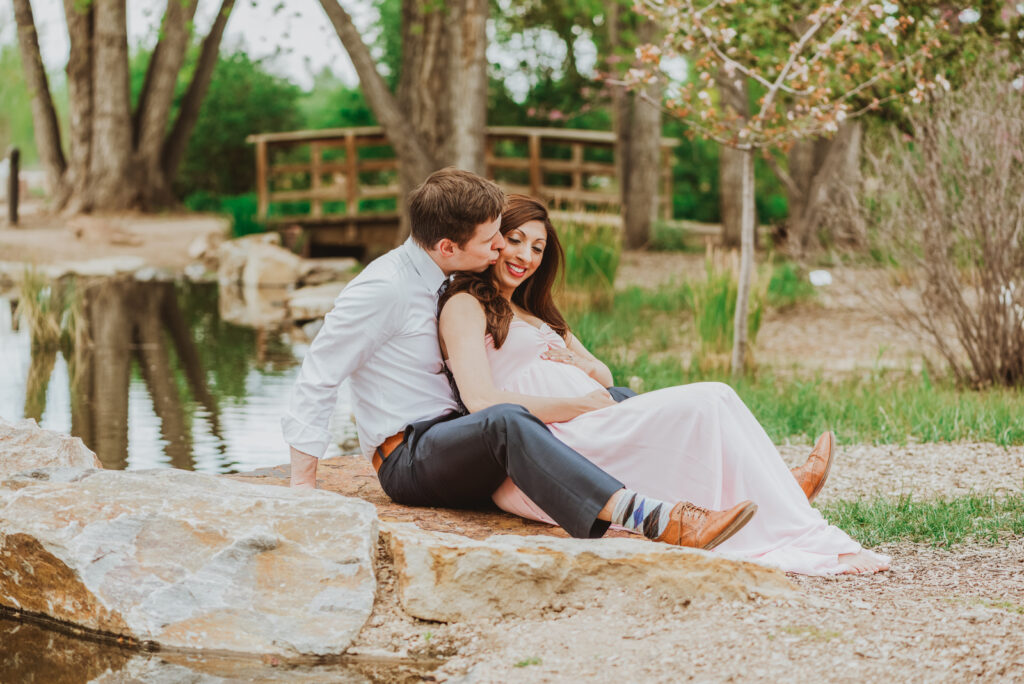 Hudson Gardens outdoor garden park floral plants candid fun loving maternity picture | From the Hip Photo Denver Colorado portrait photography