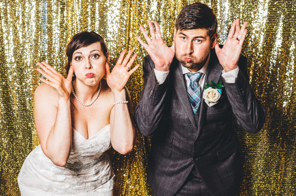 Bride and groom pull funny faces | Wedding photo booth | Funny photo | Planning dream wedding 