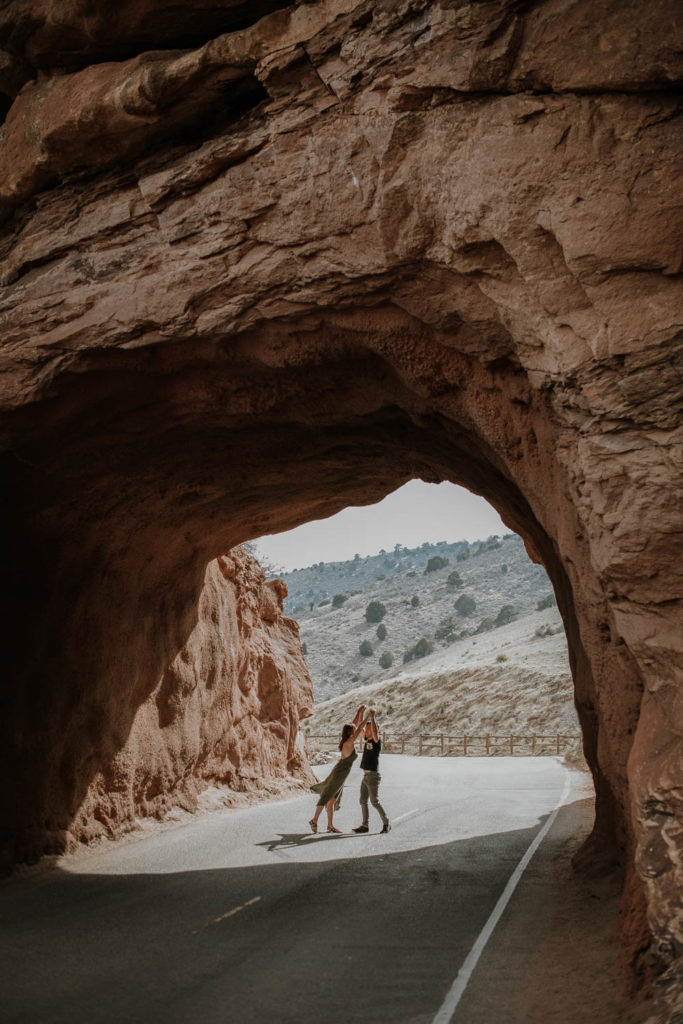 Red Rocks, Colorado | Wide shot Mountains Cave Outdoors | Couple yoga | Engagement photos