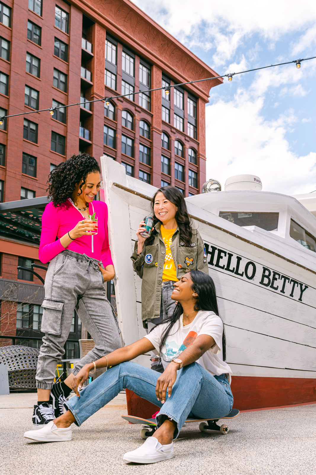 Restaurant photography | Three women hanging around and drinking by "Hello Betty" boat | Bethesda, MD | Oceanside, CA