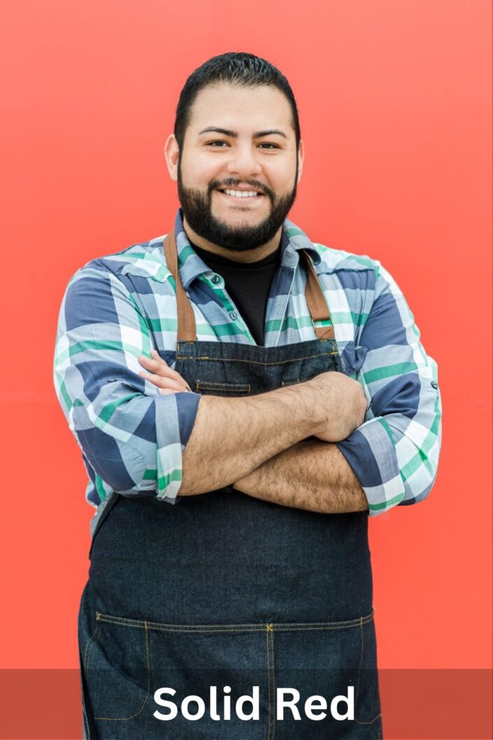 Professional portrait on Solid Red backdrop — Denver studio photography by From the Hip Photo