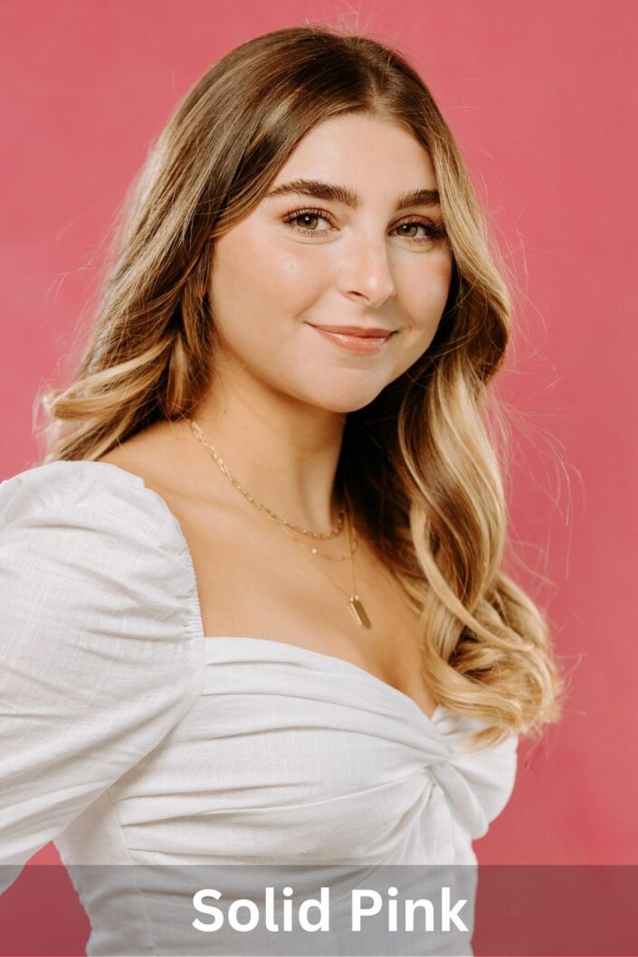 Professional portrait on Solid Pink backdrop — Denver studio photography by From the Hip Photo