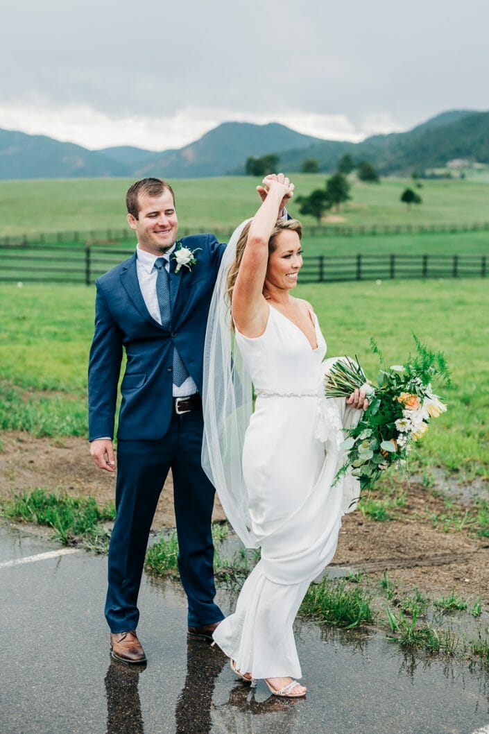 First Look in the Rain on Wedding Day | Larkspur Colorado Elopement Photographer
