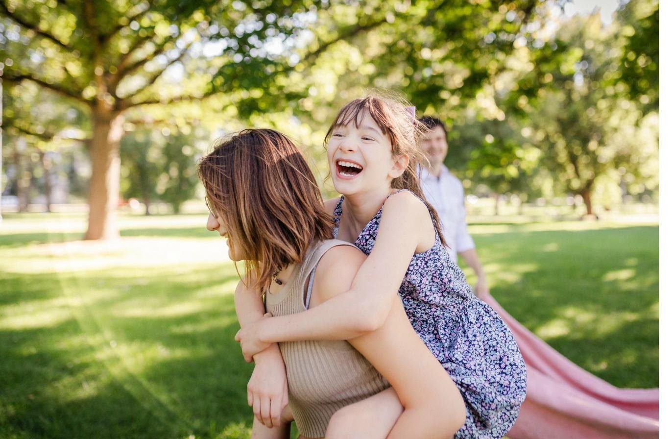 Natural candid family moment captured by Denver family photographer