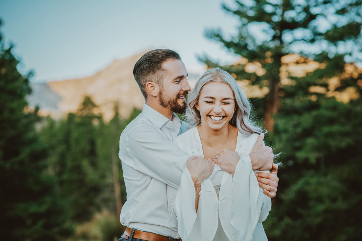 Couple sharing a romantic moment during sunset engagement session in Denver, Colorado