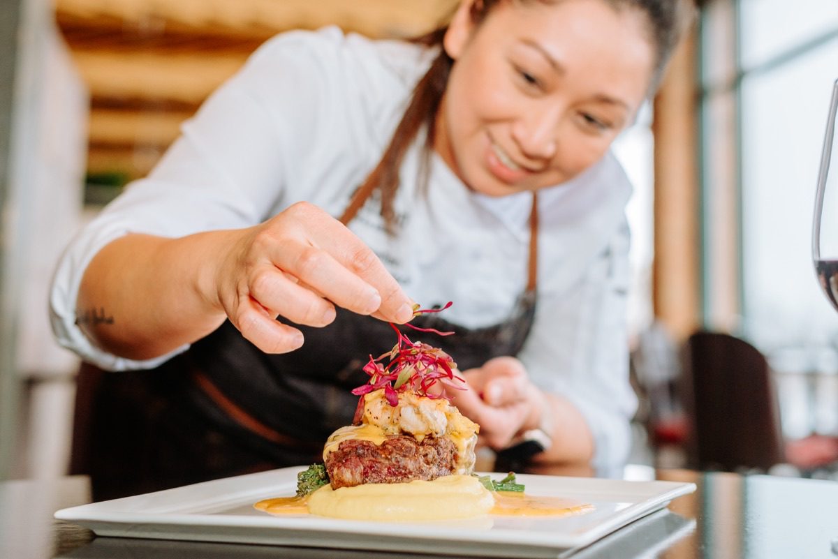 Denver restaurant photographer shoots elegant plated entree with dramatic lighting