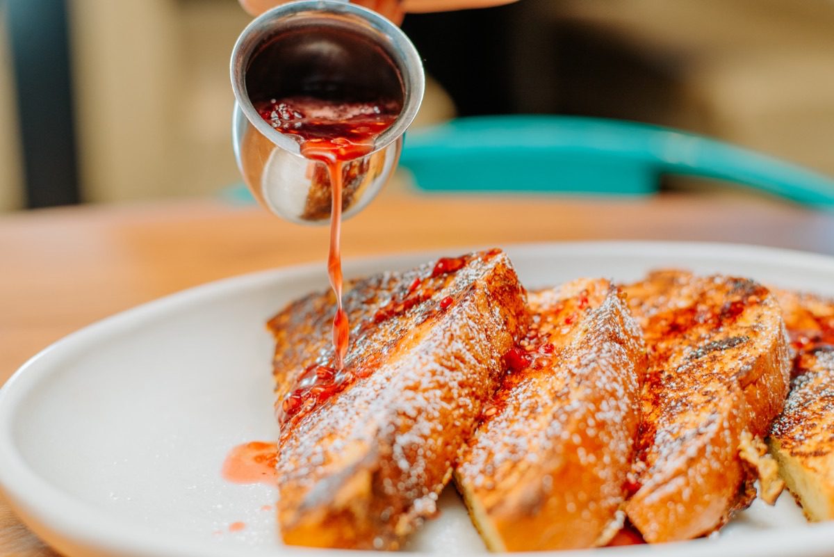 Denver restaurant photographer documents craft cocktail preparation at the bar