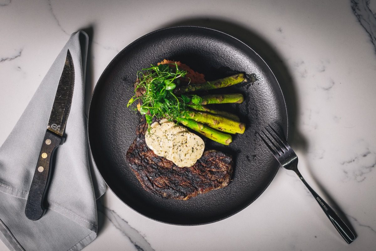 Denver food photographer documents craft cocktail garnish detail at Colorado bar