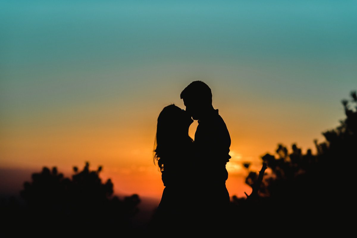 Couple at Lost Gulch Overlook in Boulder during Colorado engagement photography session with mountain views