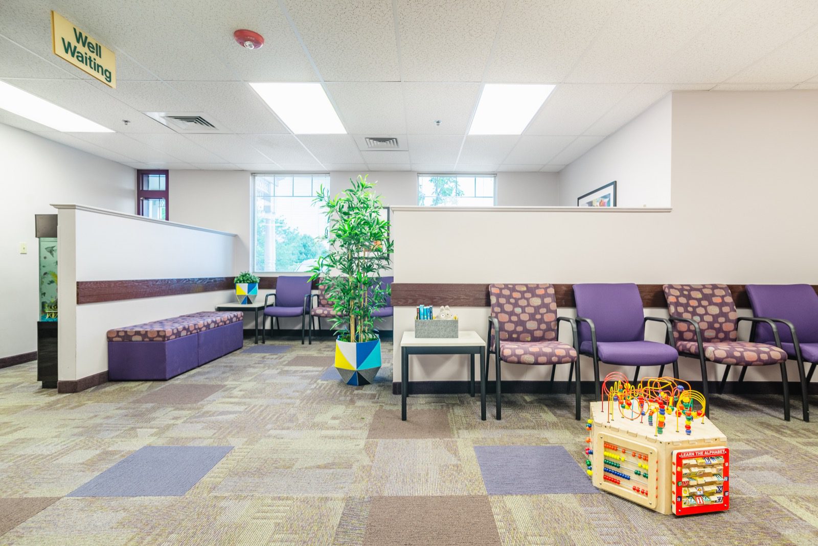 Pediatric doctor consulting with family Denver