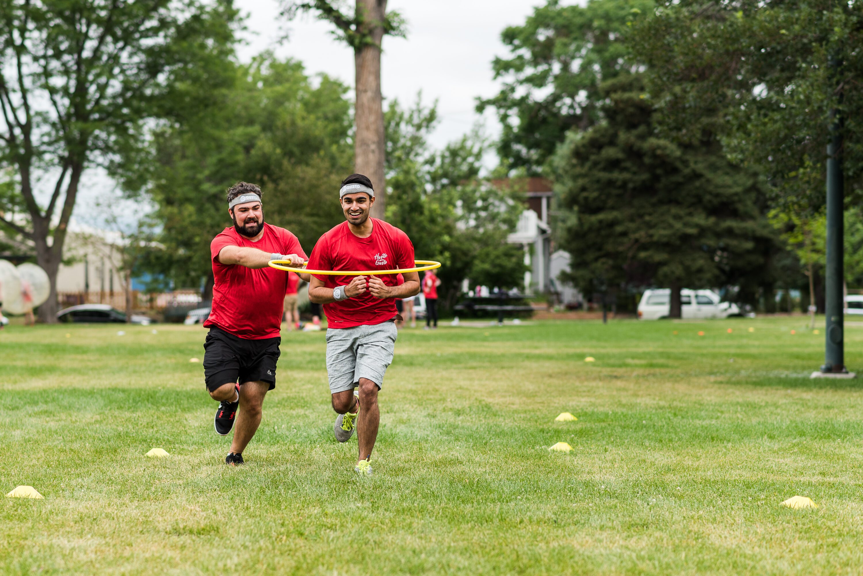 Relay race teamwork during corporate event