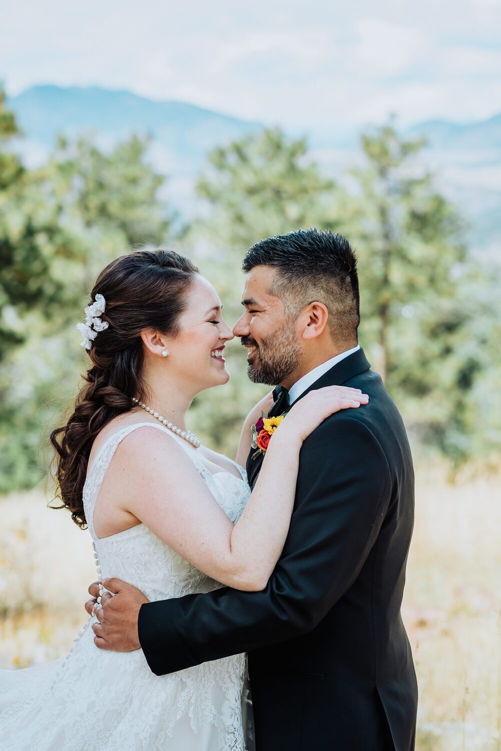 Bride and groom close together at the Boettcher Mansion on Lookout Mountain