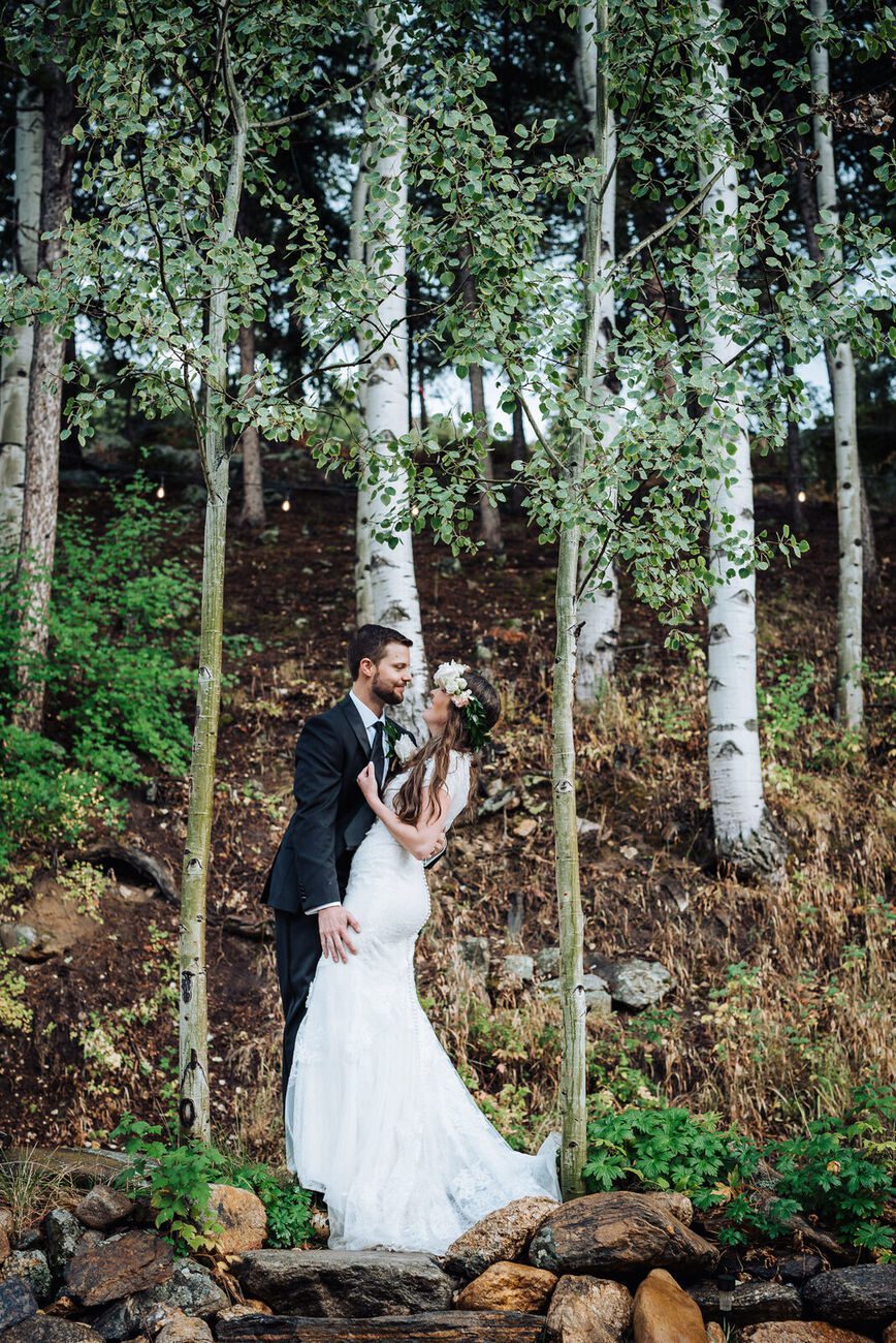 Bride and groom together in the aspen grove at Blackstone Rivers Ranch