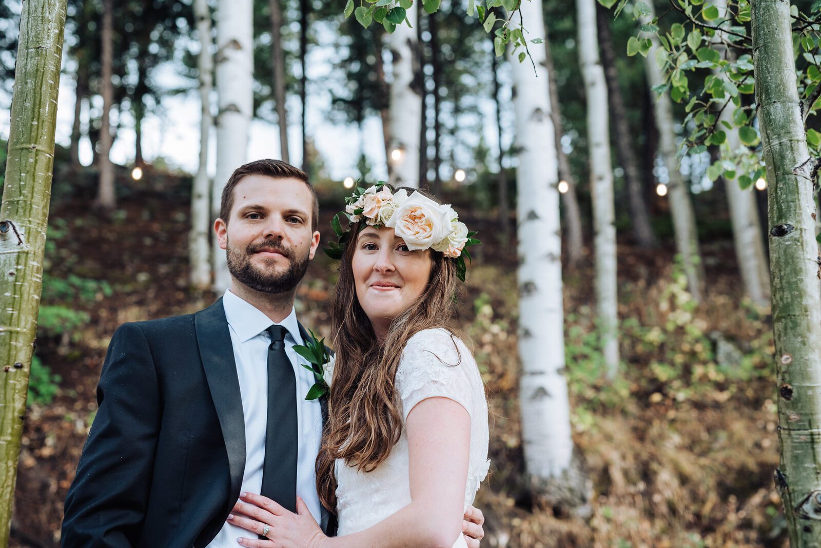 Bride in a flower crown with her groom at Blackstone Rivers Ranch
