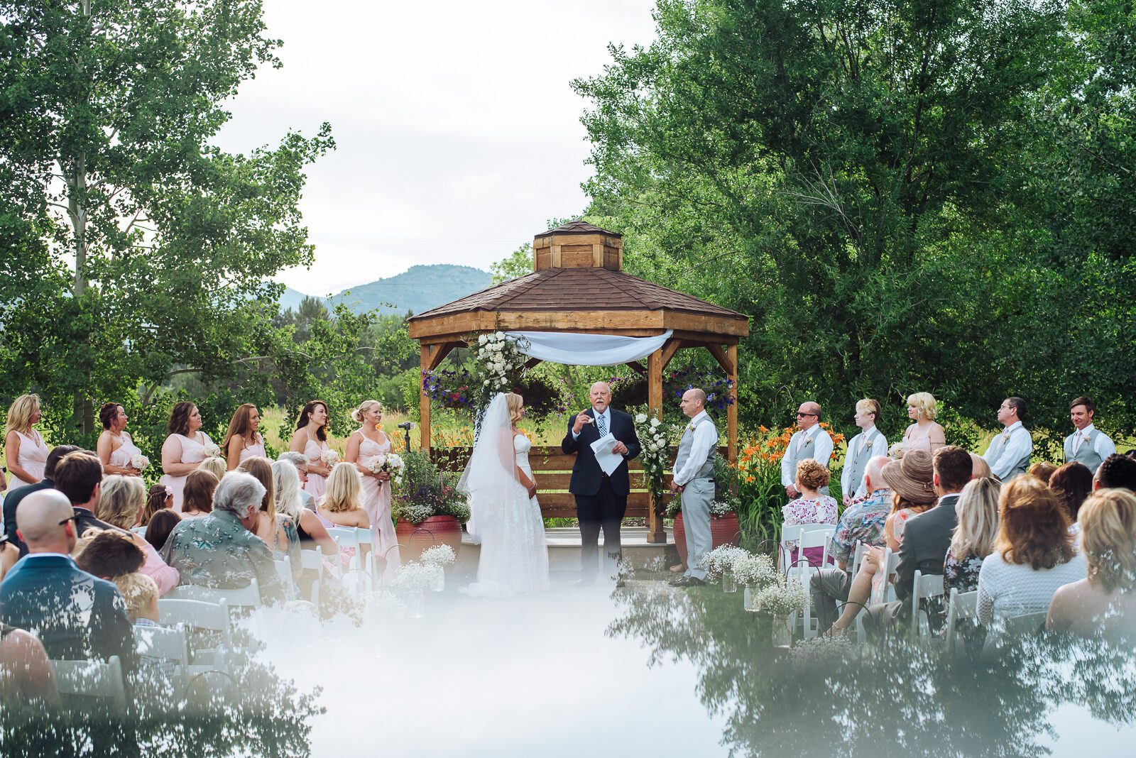 Outdoor wedding ceremony at the gazebo at Denver Botanic Gardens Chatfield Farms