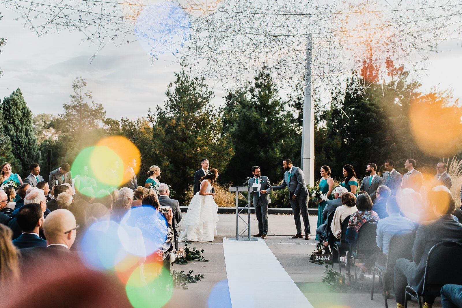 The walk down the aisle at a Denver Museum of Nature and Science wedding
