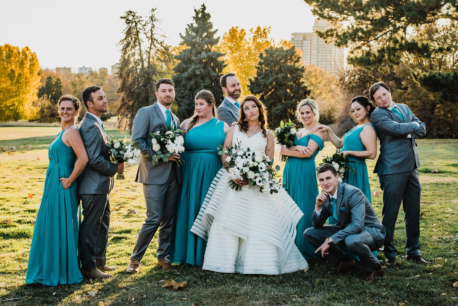 Wedding party in the autumn cottonwoods of City Park beside the Denver Museum of Nature and Science