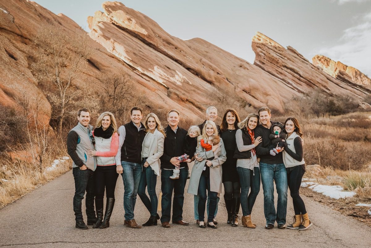 Extended family portrait in front of the red sandstone fins at Red Rocks Park