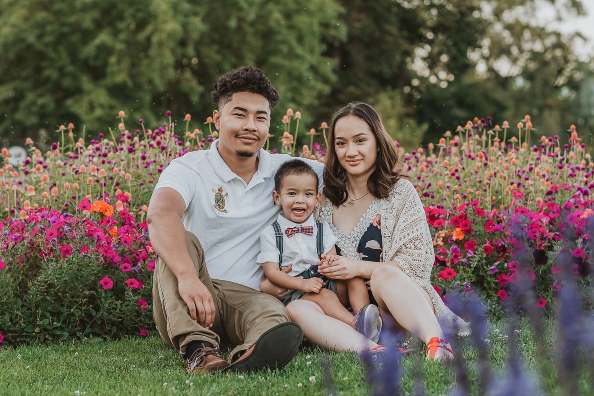 Family photo session among the flower gardens at Washington Park in Denver