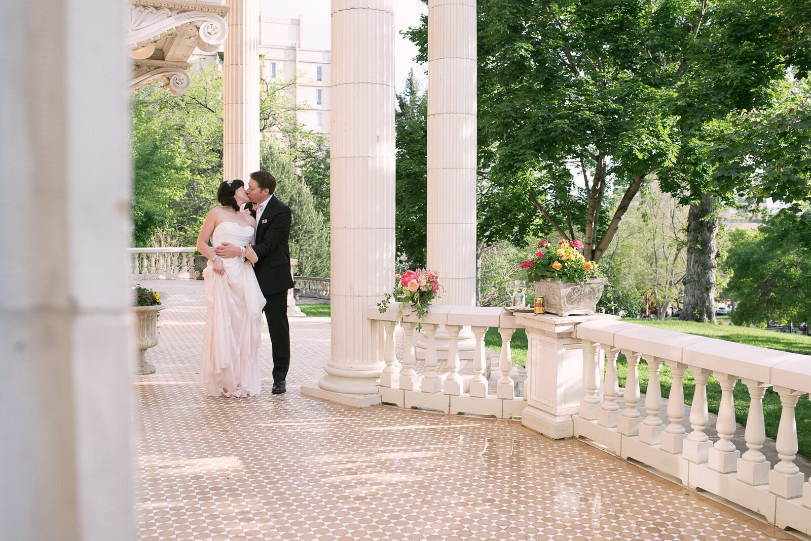The long colonnaded veranda at the Grant-Humphreys Mansion, a couple at the far end