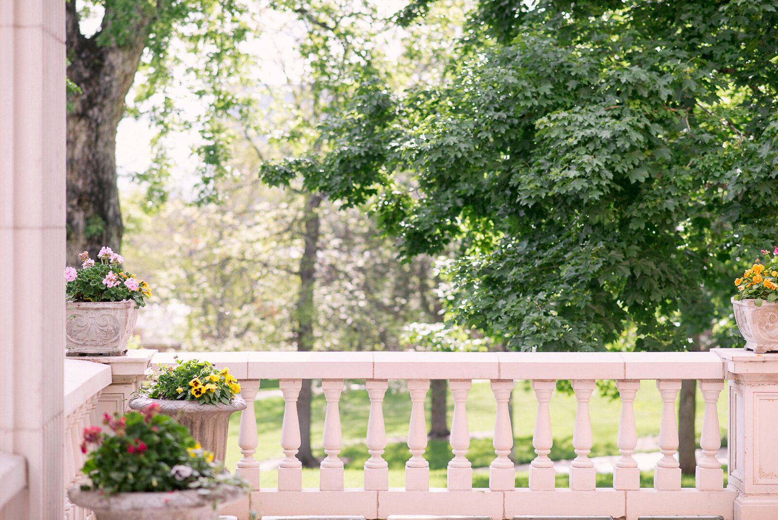 The colonnaded veranda and stone balustrade at the Grant-Humphreys Mansion, set for a Denver wedding