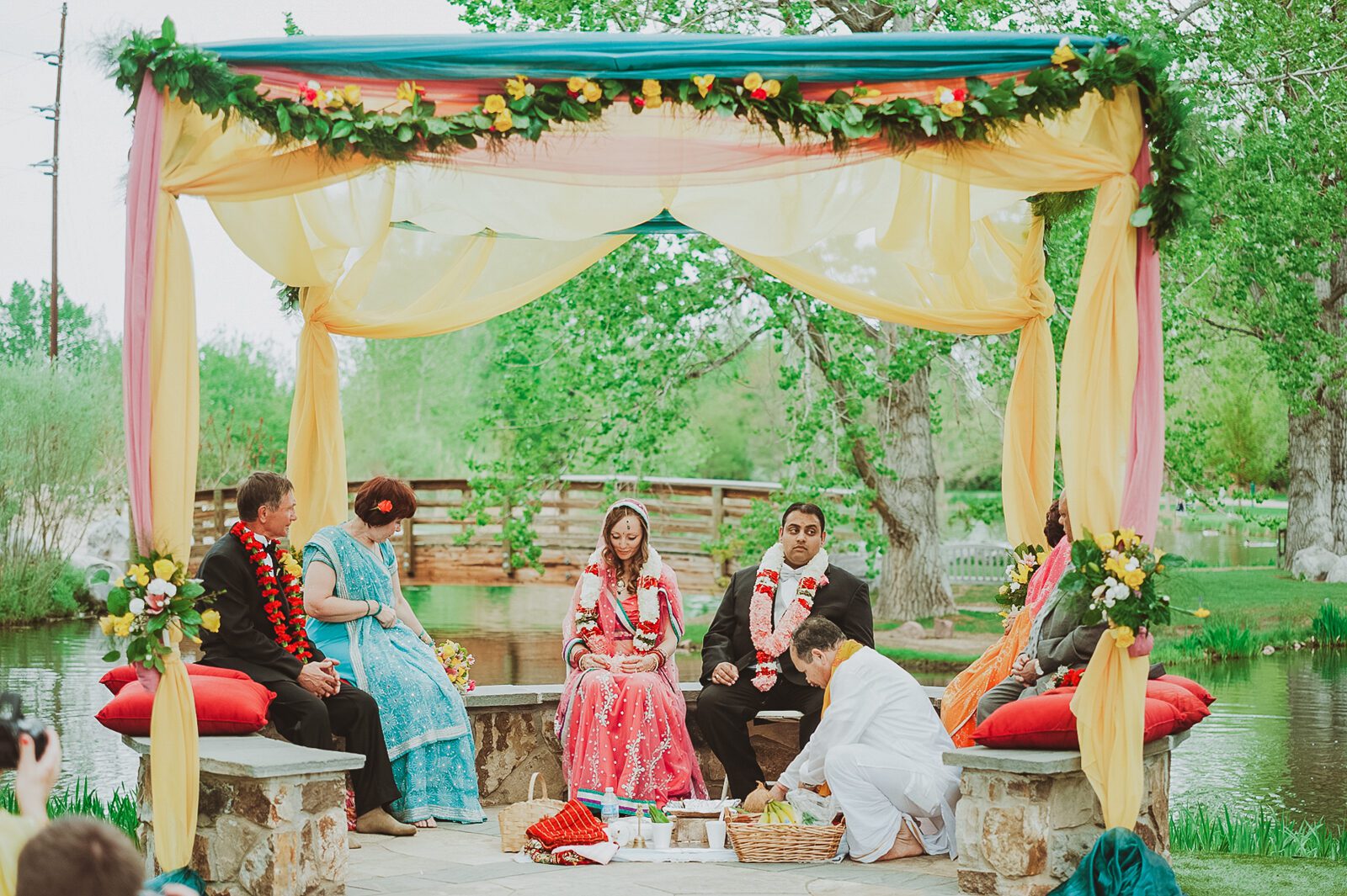 A Hindu wedding ceremony under the mandap at Hudson Gardens